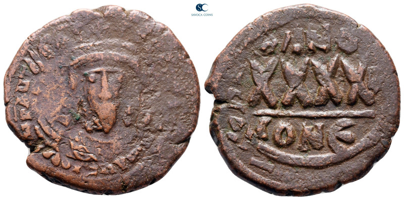 Phocas AD 602-610. Constantinople
Follis or 40 Nummi Æ

28 mm, 10,25 g


...