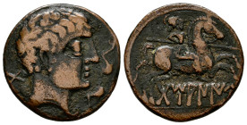 Tamaniu. Unit. 120-20 BC. Area of Aragon. (Abh-889). Anv.: Male head right, two dolphins before, iberian letter DA behind. Rev.: Horseman right, holdi...