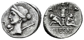 Julius Caesar. Denarius. 44 BC. Galia. (Ffc-12). (Craw-468/2). (Cal-646). Anv.: Diademed head of Venus left, Cupid and lituus before, sceptre behind. ...