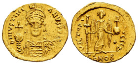 Justinian I. Solidus. 527-538 AD. Constantinople. (MIBE-6). (Doc-8c). (Sear-139). Anv.: D N IVSTINIANVS P P AVC, helmeted and cuirassed bust facing, h...