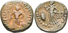 INDIA, Yaudheya. Circa 3rd-4th century. AE (Bronze, 24 mm, 11.15 g, 12 h). YAUDHEYA GANASA JAYA (in Brahmi) Karttikeya standing facing, holding spear ...