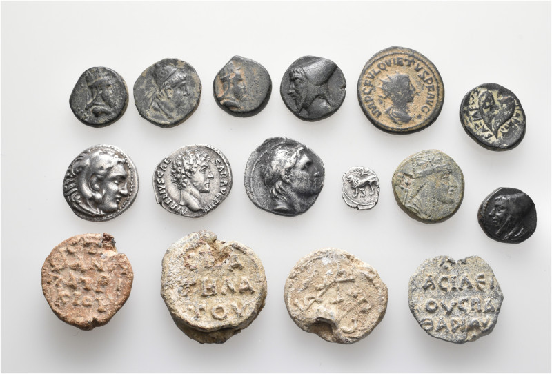 A lot containing 16 silver and bronze coins and lead seals. Including: Greek, Ar...