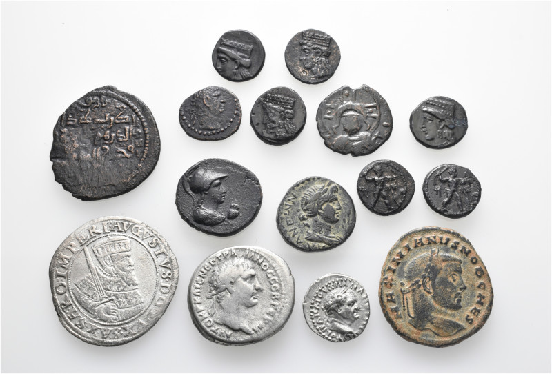 A lot containing 15 silver and bronze coins. Including: Greek, Roman Provincial,...