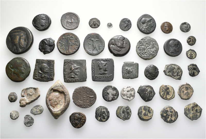 A lot containing 43 silver and bronze coins and lead weights. Including: Greek a...