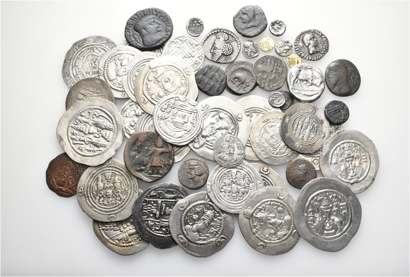 A lot containing 52 gold, silver and bronze coins. Including: Greek, Oriental Gr...