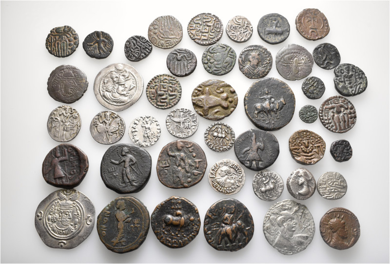 A lot containing 43 silver and bronze coins. All: India. Mostly Indo-Skythian, I...