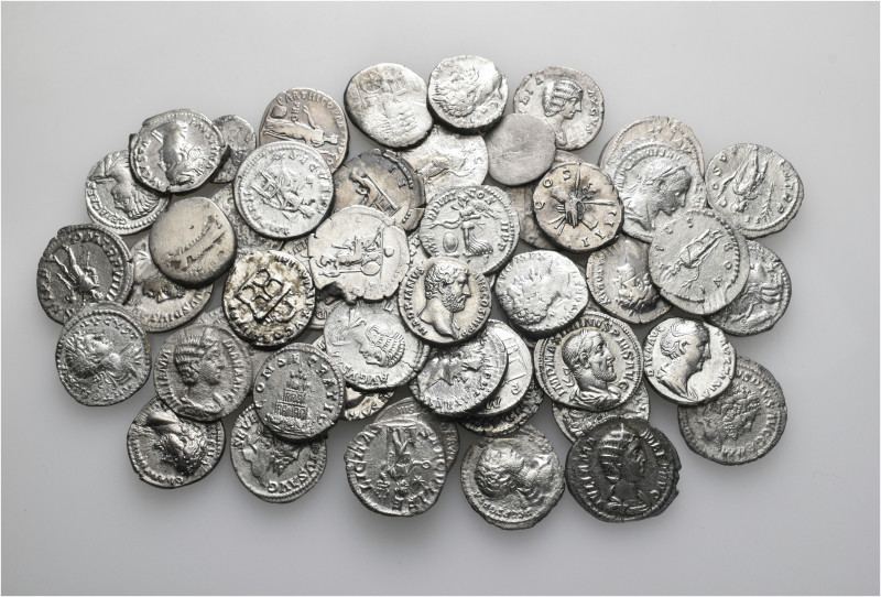 A lot containing 50 silver coins. Including: Roman Republican and Roman Imperial...