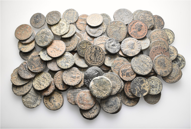 A lot containing 107 bronze coins. Including: Greek, Roman Provincial and Roman ...