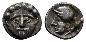 Pisidia. Selge circa 350-300 BC. Obol AR (9mm, 0.60 g). Facing gorgoneion with protruding tongue / Head of Athena to left, wearing crested Attic helme...