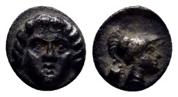 Pisidia, Selge AR Obol. (8mm, 0.90 g) Circa 350-300 BC. Gorgoneion / Helmeted head of Athena right; astragalos behind.