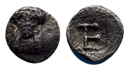 IONIA, Kolophon. Circa 500-450 BC. AR Tetartemorion (6mm, 0.40 g). Facing head of Apollo with long hair locks / TE monogram within incuse square.