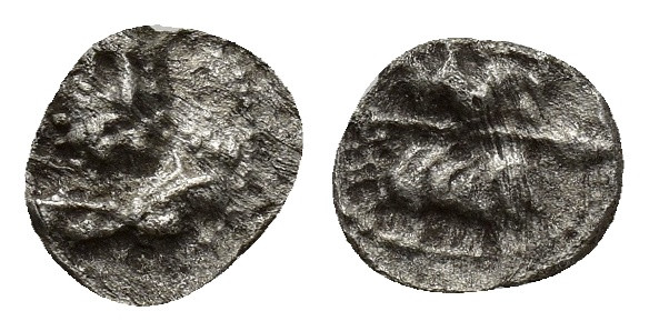 CILICIA, Uncertain. 4th century BC. AR Tetartemorion (6mm, 0.21 g). Laureate and...