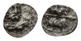 CILICIA, Uncertain. 4th century BC. AR Tetartemorion (6mm, 0.21 g). Laureate and bearded head of Herakles facing slightly right, with lion’s skin tied...