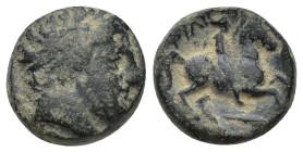 KINGS OF MACEDON. Philip II (359-336 BC). Ae. (14mm, 4.57 g) Uncertain mint in Macedon. Obv: Diademed head of Apollo right. Rev: ΦΙΛΙΠΠΟΥ. Naked youth...