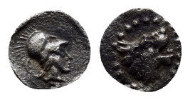 Pamphylia, Side. Ca. 3rd-2nd century B.C. AR obol (6mm, 0.10 g). Helmeted head of Athena right. / Head of roaring lion right.