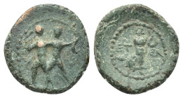 PISIDIA. Etenna. Ae (14mm, 2.57 g) (1st century BC). Obv: Two men standing side by side; the left brandishing double-axe, the right sickle. Rev: ET - ...