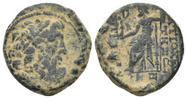 Seleucis and Pieria. Antioch circa 31-27 BC. Bronze Æ (21mm, 8.16 g). Laureate head of Zeus right. / ANTIOΧEΩΝ THΣ MHTΡOΠOΛEΩΣ, Zeus seated left, hold...