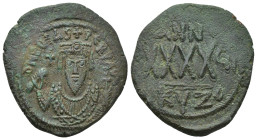 Phocas (602-610). Æ 40 Nummi (29mm, 11.00 g). Cyzicus, year 7 (608/9). Crowned facing bust, wearing consular robes, holding mappa and eagle sceptre wi...