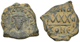 Phocas (602-610). Æ 40 Nummi (27mm, 11.53 g). Constantinople, year 8 (609/10). Crowned bust facing, wearing consular robes, holding mappa and cross. R...