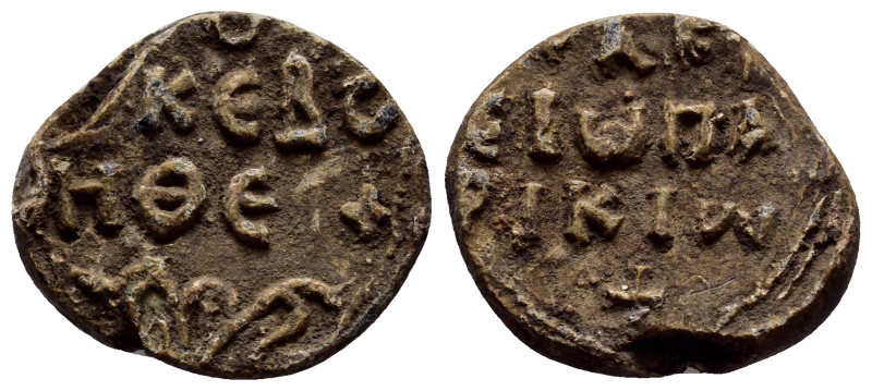 BYZANTINE LEAD SEALS. (22mm, 7.80 g). Obv: Legend three lines, decorations below...