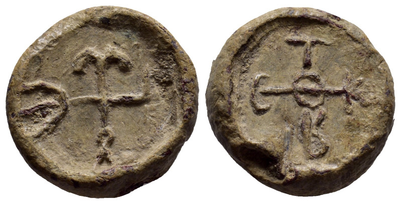BYZANTINE LEAD SEALS. (20mm, 12.50 g). Obv: Cruciform monogram. Rev: Legend five...