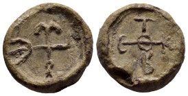 BYZANTINE LEAD SEALS. (20mm, 12.50 g). Obv: Cruciform monogram. Rev: Legend five lines.