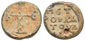 BYZANTINE LEAD SEALS. (22mm, 16.44 g). Obv: Cruciform monogram. Rev: Legend four lines.