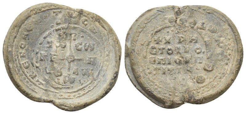 BYZANTINE LEAD SEALS. (28mm, 9.88 g). Obv: Cruciform monogram. Rev: Legend four ...