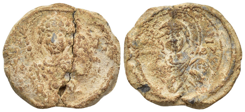 BYZANTINE LEAD SEALS. (24mm, 9.47 g). Obv: Facing bust of St. Demetrius, holding...