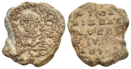 BYZANTINE LEAD SEALS. (21mm, 7.98 g). Obv: Facing bust of uncertain saint. Rev: Legend five lines.