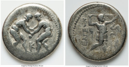PISIDIA. Selge. Ca. 325-250 BC. AR stater (24mm, 10.19 gm, 12h). Fine. Two wrestlers grappling, K between / ΣΕΛΓΕΩΝ, slinger striding to right, pullin...