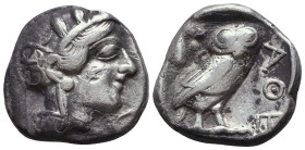 Athens , Attica. AR Tetradrachm c. 440-420 BC.Obv. Helmeted head of Athena right.Rev. Owl standing right, head facing, olive sprig and crescent behind...