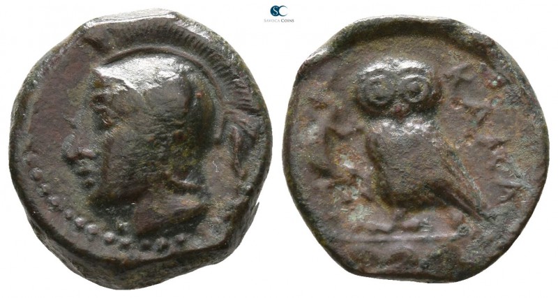 Sicily. Kamarina circa 420-405 BC. 
Tetras Æ

13mm., 3,64g.



very fine