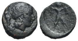 Northern Lucania, Poseidonia, c. 420-390 BC. Æ (16mm, 2.87g, 10h). Helmeted head of Athena r. R/ Poseidon wielding trident r. HNItaly 1155. Dark patin...