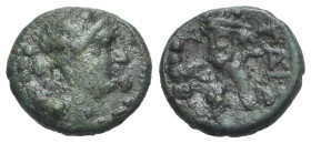 Northern Lucania, Paestum, 218-201 BC. Æ Triens (17mm, 3.50g, 12h). Female head r. wearing ivy wreath; four pellets to l. R/ Cornucopia; four pellets ...