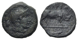 Southern Lucania, Thourioi, c. 435-410/05 BC. Æ (15mm, 3.66g, 3h). Helmeted head of Athena r. R/ Bull butting r.; fish below. Cf. HNItaly 1904. Good F...
