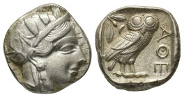 Attica, Athens, c. 454-404 BC. AR Tetradrachm (22mm, 17.18g). Helmeted head of Athena r. R/ Owl standing r., head facing; olive sprig behind; all with...