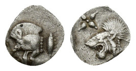 Mysia, Kyzikos, c. 450-400 BC. AR Hemiobol (9mm, 0.37g). Forepart of boar l.; tunny to r. R/ Head of lion l.; star to l.; all within incuse square. Vo...