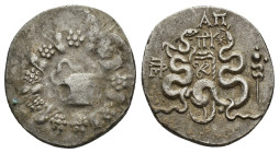 Mysia, Pergamon, c. 166-67 BC. AR Cistophoric Tetradrachm (24mm, 12.57g), c. 76 BC. Cista mystica with serpent; all within ivy-wreath. R/ Two serpents...
