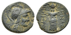Mysia, Pergamon, c. 133-27 BC. Æ (19mm, 4.77g). Helmeted head of Athena r. R/ Trophy consisting of helmet and cuirass; monogram to inner l. SNG BnF 18...