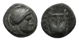 Islands of Caria, Kalymnos(?), 3rd-2nd centuries BC. Æ (10mm, 1.37g). Helmeted male head r. R/ Lyre. Cf. SNG Copenhagen 606-7. Rare, near VF