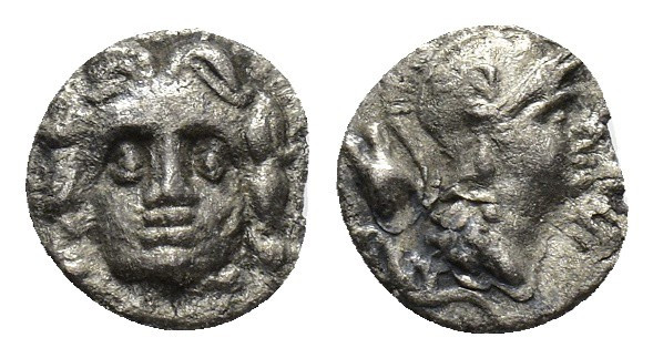 Pisidia, Selge, c. 350-300 BC. AR Obol (10mm, 0.85g). Facing gorgoneion. R/ Helm...