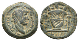 Hadrian (117-138). Egypt, Alexandria. Æ Obol (18mm, 4.70g), year 21 (AD 136/7). Laureate head r. R/ Calathus between two torches; L KA (date) in exerg...