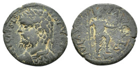 Septimius Severus (193-211). Pisidia, Parlais. Æ (20mm, 4.00g). Laureate and cuirassed bust l. R/ Mên standing r., with foot on bucranium, holding pin...