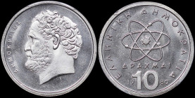 GREECE: 10 Drachmas (1980) (type I) in copper-nickel. Atom and inscription "ΕΛΛΗΝΙΚΗ ΔΗΜΟΚΡΑΤΙΑ" on obverse. Head of Demokritos facing left on reverse...