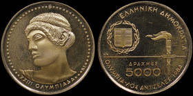 GREECE: 5000 Drachmas (1984) in gold (0,900) commemorating the XXIII Los Angeles Olympic Games 1984. National arms and torch on obverse. God Apollo on...