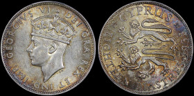 CYPRUS: 18 Piastres (1938) in silver (0,925). Crowned head of King George VI facing left on obverse. Two stylized rampant lions, date and denomination...