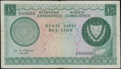 CYPRUS: 5 Pounds (1.12.1961) in dark green on multicolor unpt. Arms at right and map at lower right. S/N: "A/2 616555". WMK: Eagle head. Printed by (B...