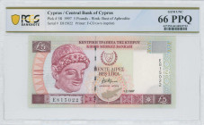CYPRUS: 5 Pounds (1.2.1997) in purple and violet on multicolor unpt. Archaic limestone head of young man at left, arms at upper center on face. S/N: "...