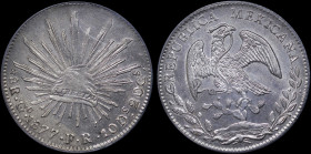 MEXICO / FIRST REPUBLIC (GUANAJUATO): 8 Reales (1877Go FR) in silver (0,903). Facing eagle and snake in beak on obverse. Radiant cap on reverse. Insid...